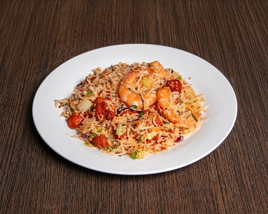 Wok-tossed Mixed Fried Rice with prawns, chicken, and vegetables