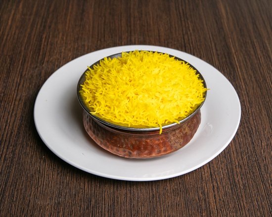 Golden aromatic Bengali Polao Saffron Rice with fragrant whole spices